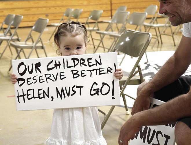 Bartlett School Board - Mazz with sign and dad looking on