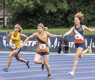 Terry Ballou - US Masters Track Championship - baton handoff