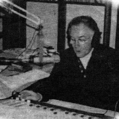 Rod Ross on the air broadcasting a game