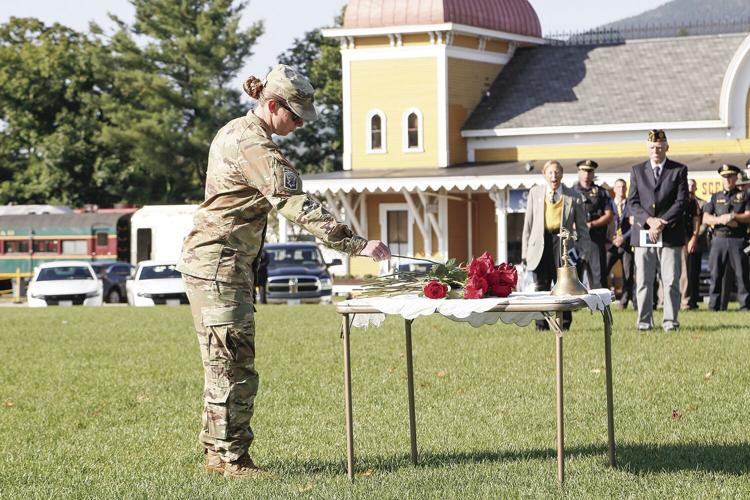 09-11-24 9-11 Remembrance flower army placing