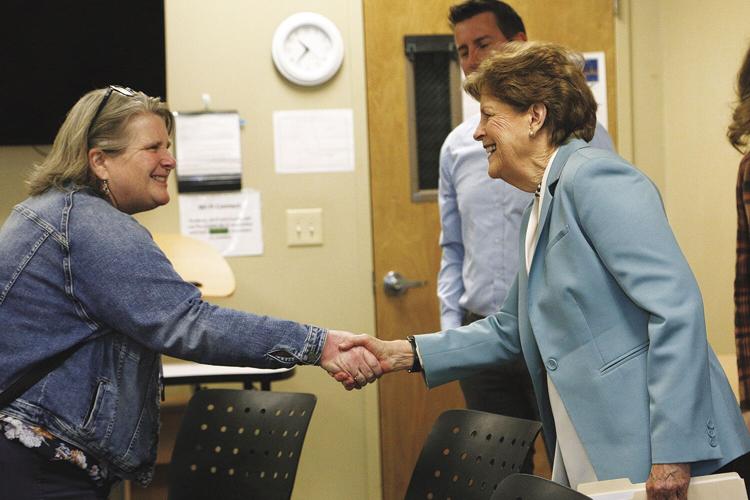 05-25-23 Shaheen shaking hands cummings