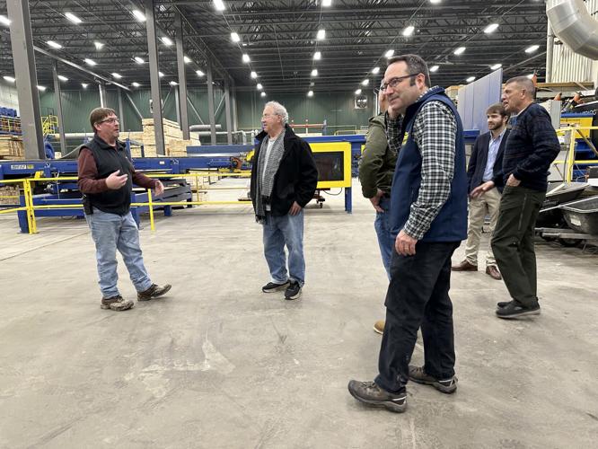State Sen. David Rochefort, R-Littleton (foreground) meets with constituents