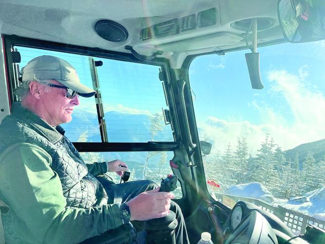Hiking - Craig Hill  drives snowcat