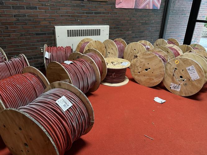 Spools of electrical wire are ready for use on repairs