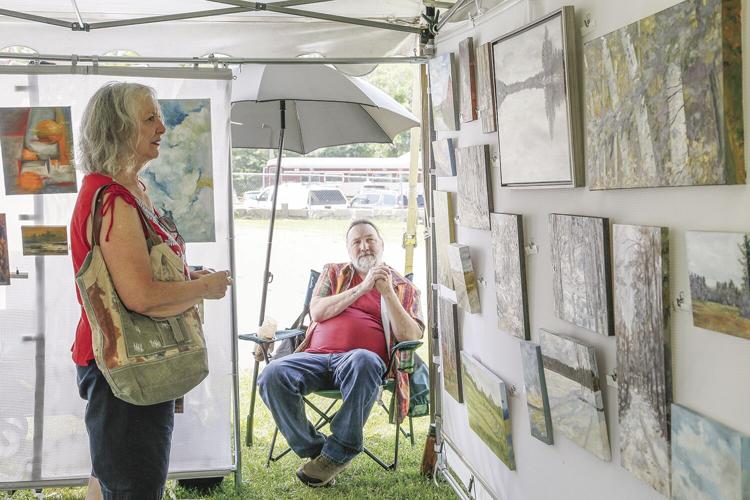 08-06-22 Art in the Park looking at painting