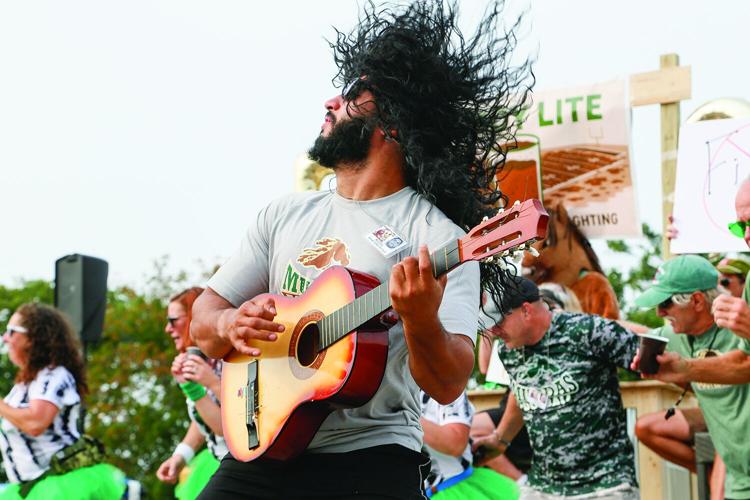 09-06-25 Mud Bowl Parade muddas rocking tighter