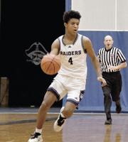 Raiders slay the Dragons in hoop opener