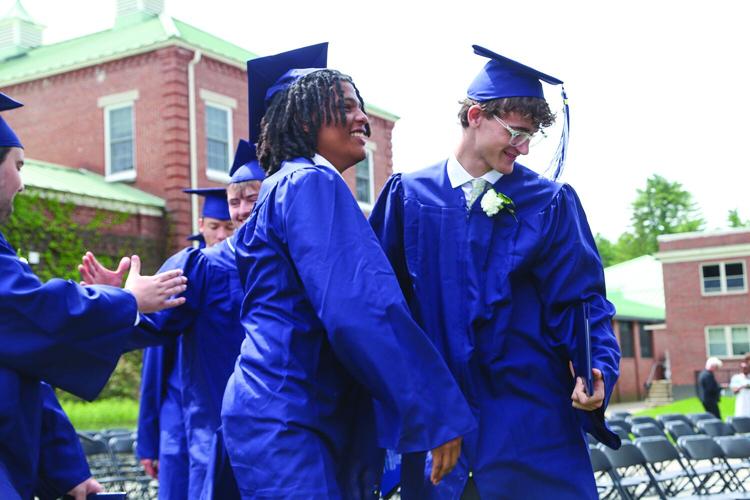 05-23-26 Fryeburg Graduation recessional hug 2