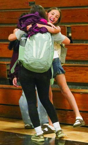 09-03-26 First Day School KMS vertical hug