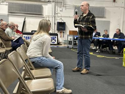 Gorham resident Theodore "Ted" Miller speaks to the night's audience on Article 17