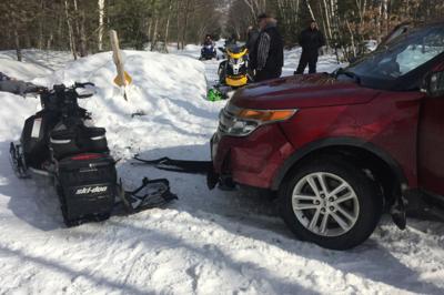 Snowmobile and car collide in Gorham