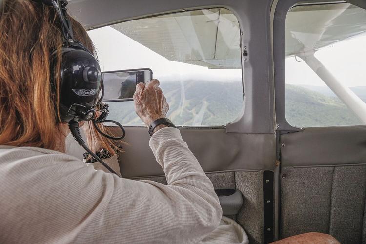 08-27-22 Aviation Day taking photo out plane