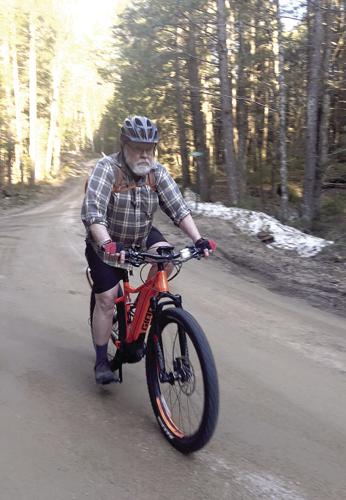 Wheel Family Fun - Peter Minnich pedals down Greeley Road