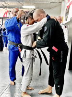 Creighton professor earns black belt in jiu-jitsu