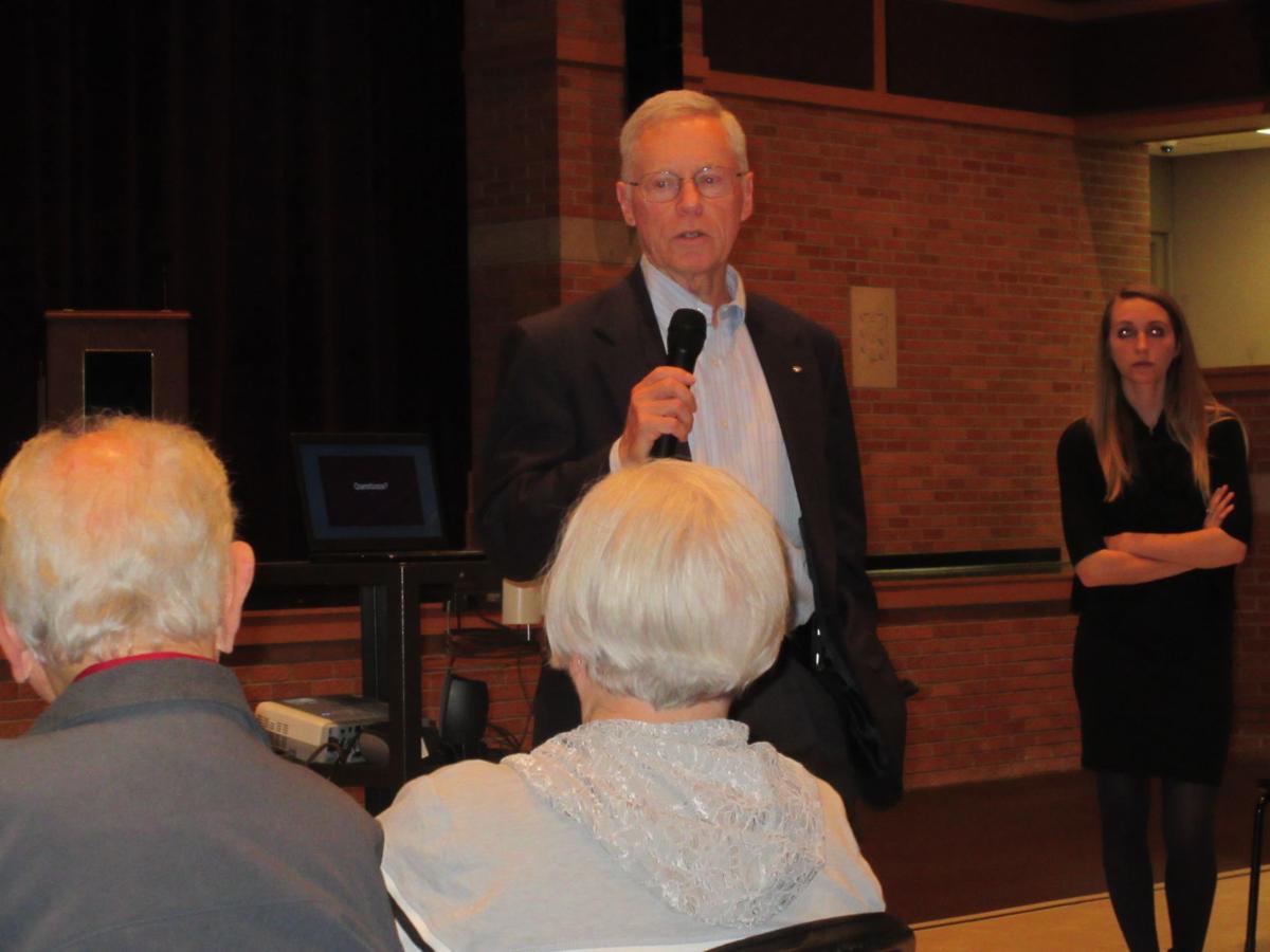 Dave Burtch of the Paulding County Vision Board addresses a concern from the audience during a meeting Monday at Paulding High School.