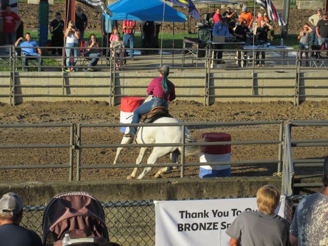 Rodeo fills the grandstand at the Defiance County Fair News