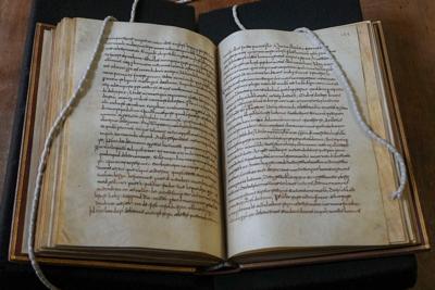 Researchers stunned by medieval book in Rome hiding oldest English poem ...