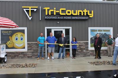 Tri County Roofing Opens New Defiance Location Local Business Taking Part In The Ribbon Cutting Ceremony For New Defiance Location Of Tri County Roofing And Home Improvement Are From Left A J Johnson