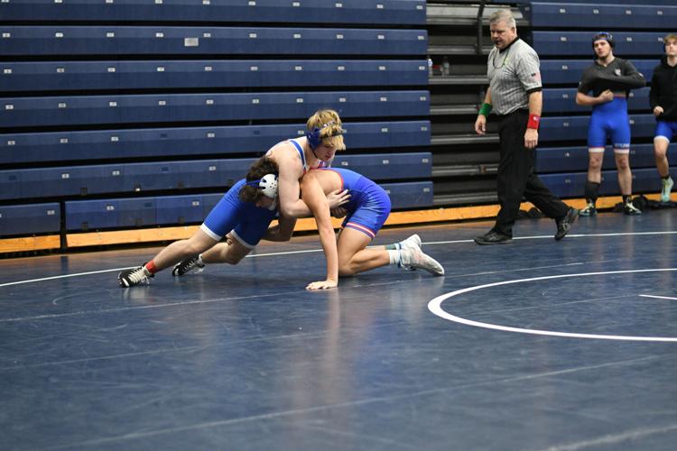 Saturday wrestling Dominique, Wellman top local finishers at Maumee