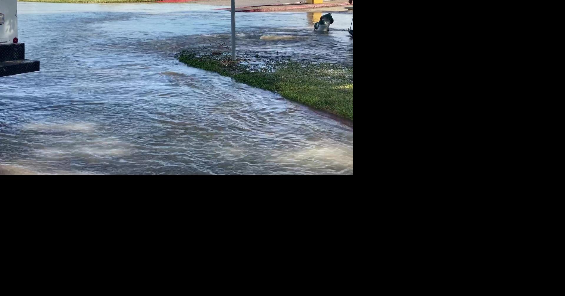 18-wheeler hits fire hydrant causing some flooding in mall parking lot ...