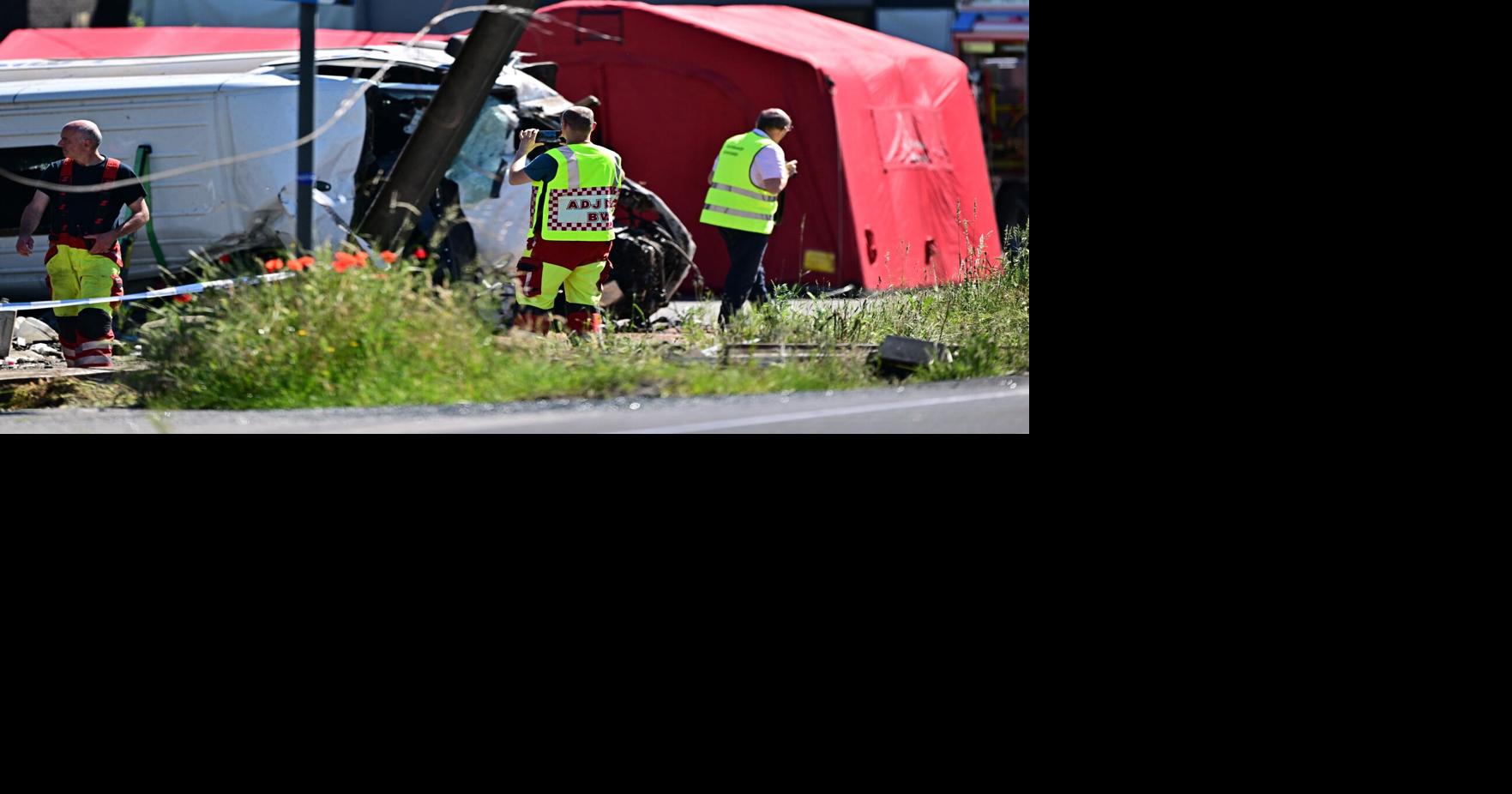 Four killed as Belgian school bus hit by train after appearing to plow through barrier