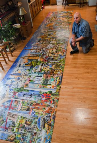 Timelapse Of Man Assembling A Giant 42,000-Piece Puzzle Of World