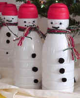 Snowmen made out of coffee creamer containers. Great project for