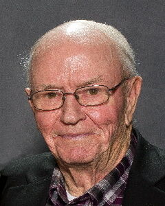 Lowell E. Peterson, 83