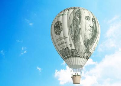 cash dollar balloon rising