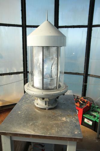 Full-sized Fresnel lens on display at Cape St. George Lighthouse