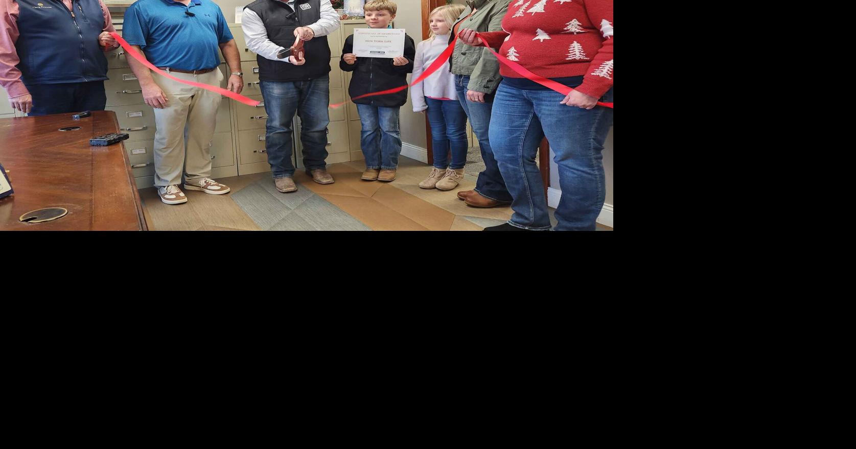 Ribbon cutting celebrating Chamber membership of Tim Moran, New York Life