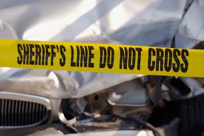Sheriff caution tape car accident