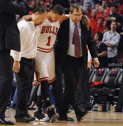 Bulls lose Rose for postseason in win over 76ers