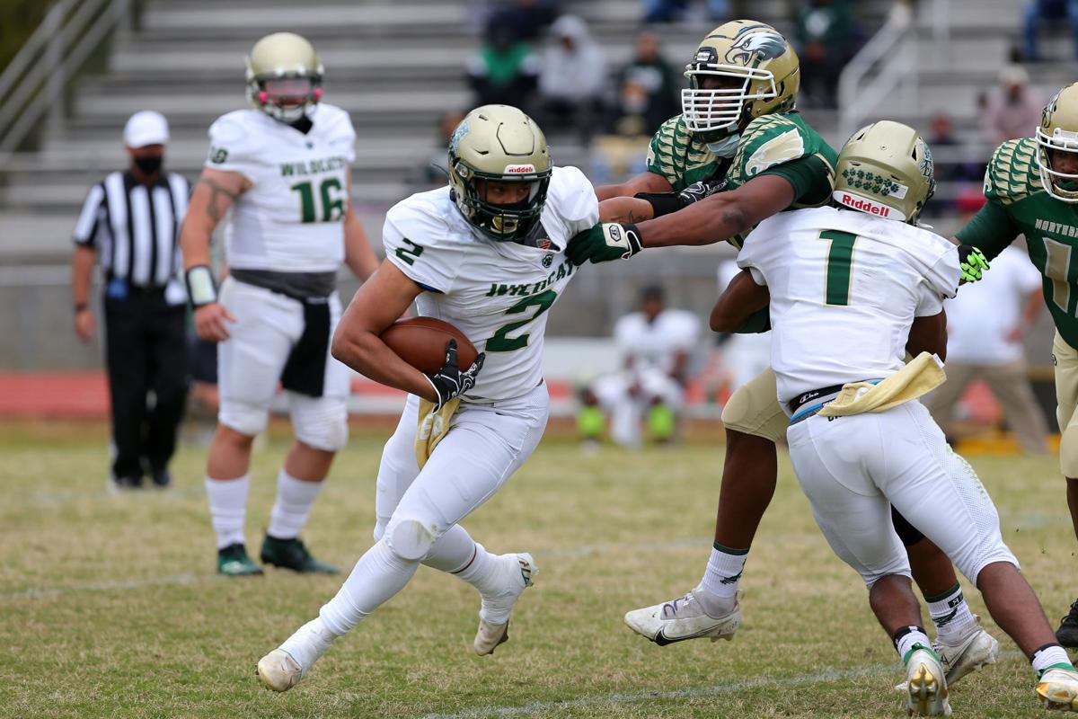042421_eda_football_northeastern_freshwater_erandolph_playoffs_4