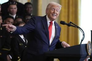 The Latest: Trump hints at firing Federal Reserve chair Powell after tariff comments