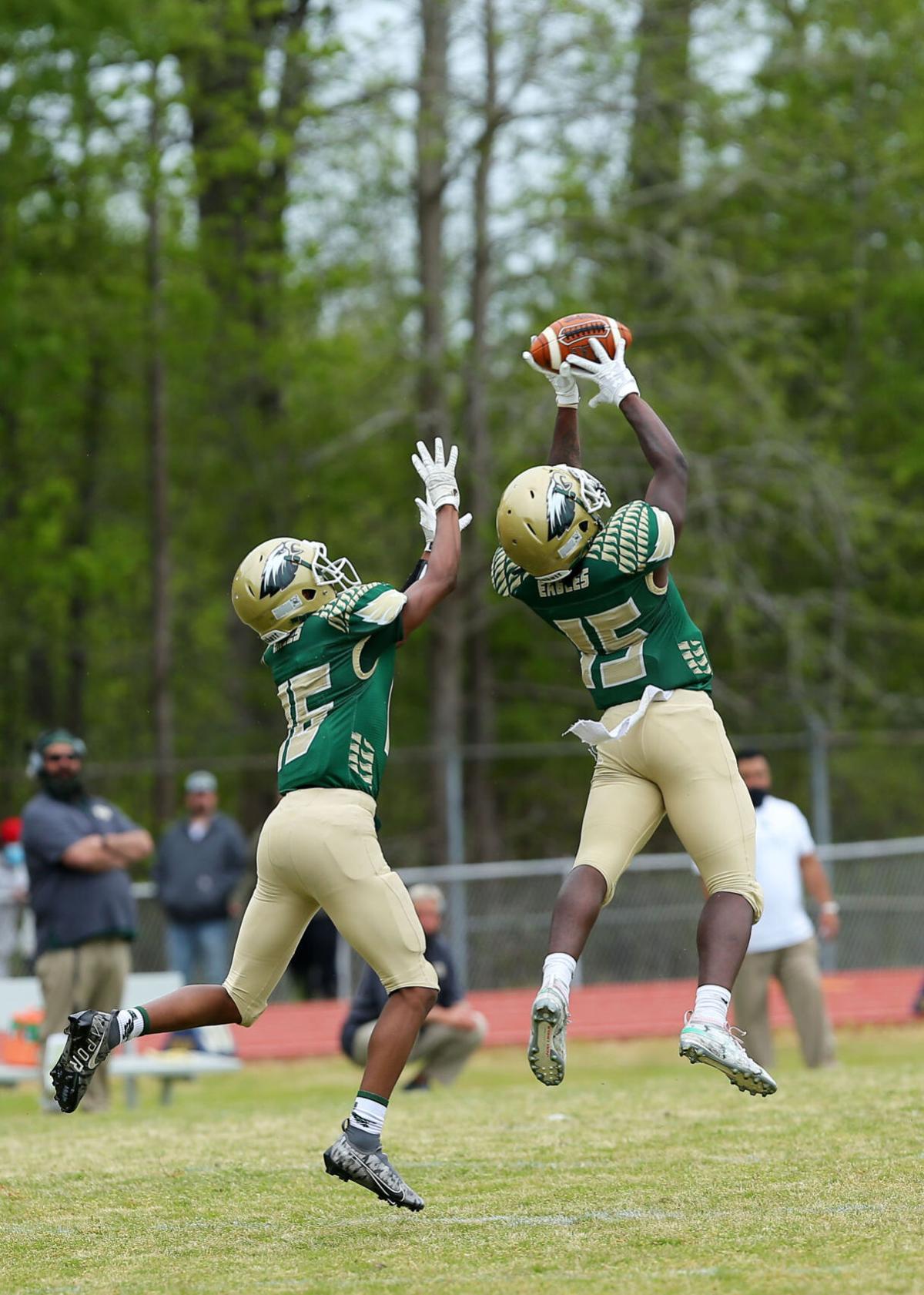042421_eda_football_northeastern_tolson_k_williams_erandolph_playoffs