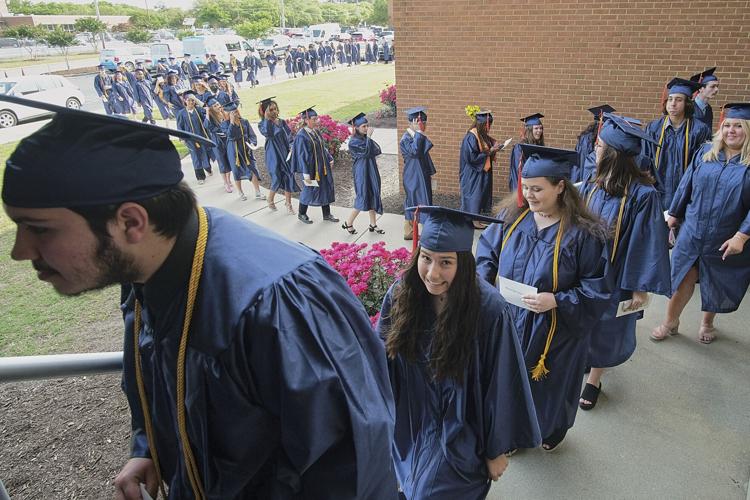 COA Commencement 170 grads turn tassels at grad ceremony Local News