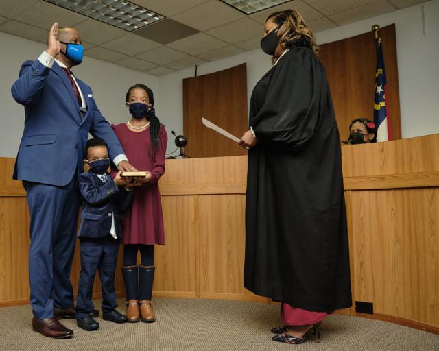 Freeman sworn in as city manager; husband of local district court judge