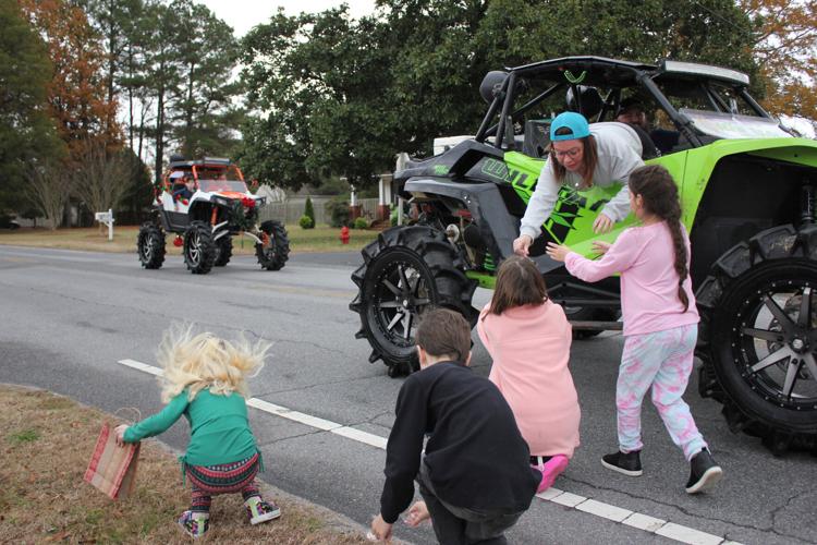 Scores get in holiday spirit as South Mills VFD Christmas Parade rolls