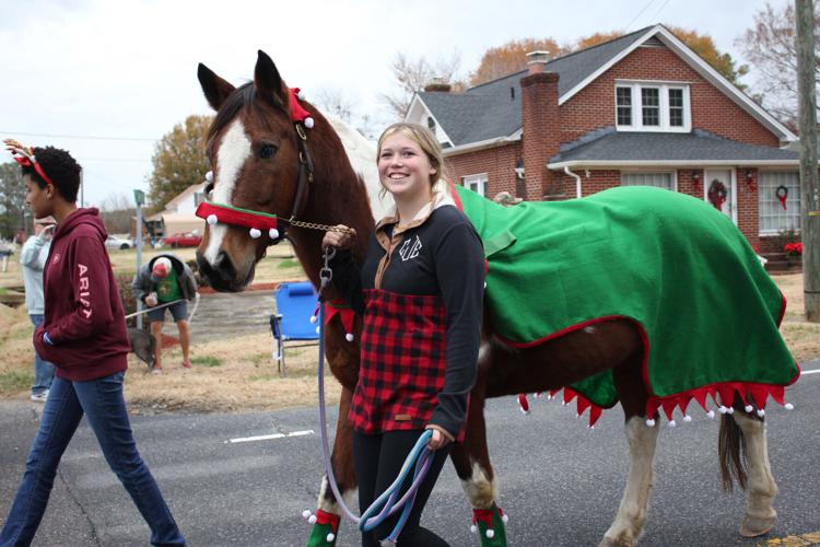 Scores get in holiday spirit as South Mills VFD Christmas Parade rolls