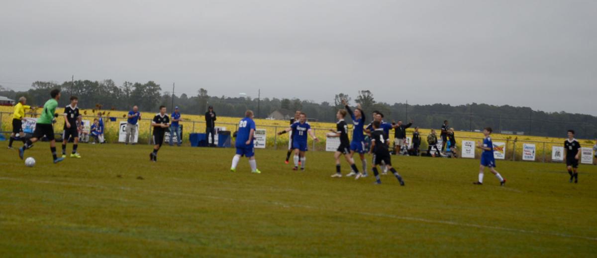 101121_eda_soccer_boys_victory_young_rockchurch_celebration