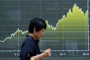 US stocks edge back from their record as oil prices rise