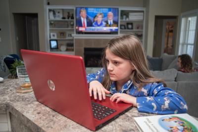 Remote learning begins: Students, parents adjusting to school changes ...