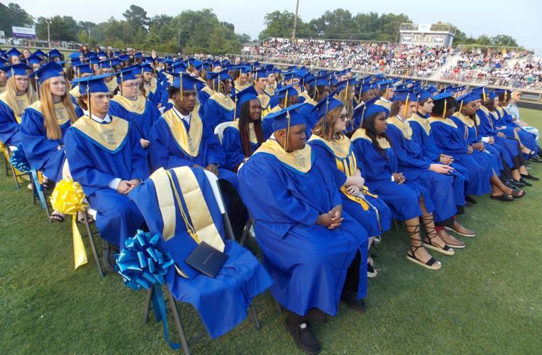 Current Holmes holds last grad ceremony; 120 turn tassels at Edenton