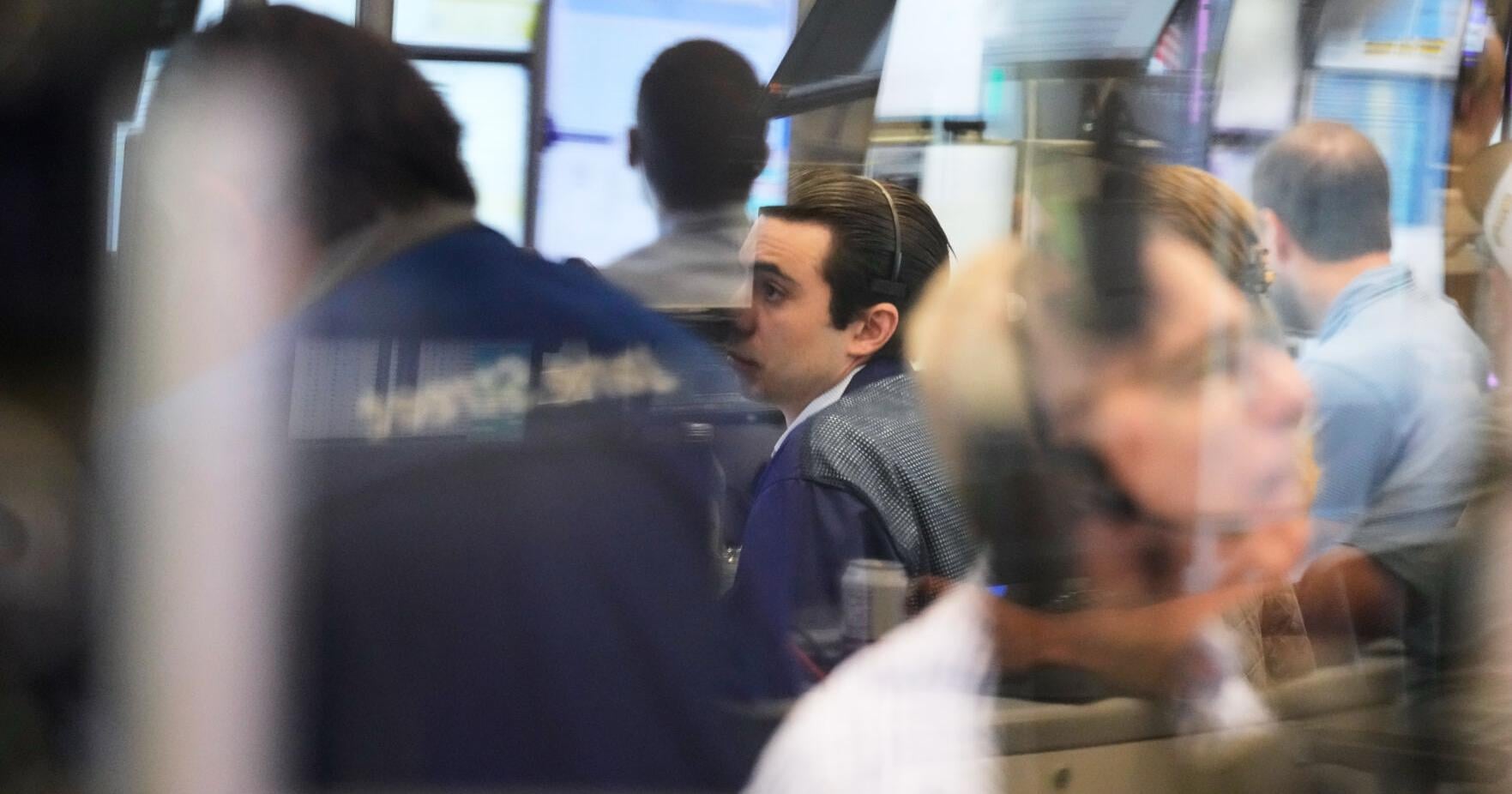 Tech stocks support Wall Street as pressure from rising bond yields rattles markets worldwide
