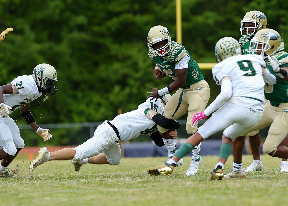 042421_eda_football_northeastern_riddick_erandolph_playoffs