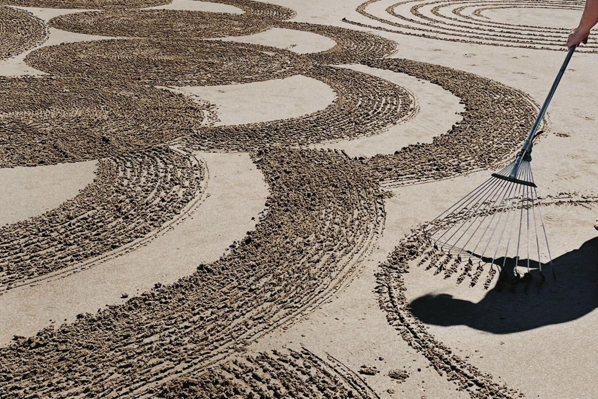 California sand artist brings moments of Zen to storm-battered coast