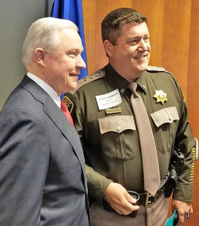 Sheriff bashed, praised for Sessions meeting