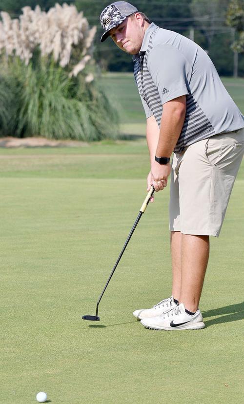 Kossuth grad leads NE to first round lead