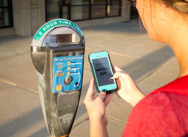 Downtown Lincoln implements pay by phone parking News